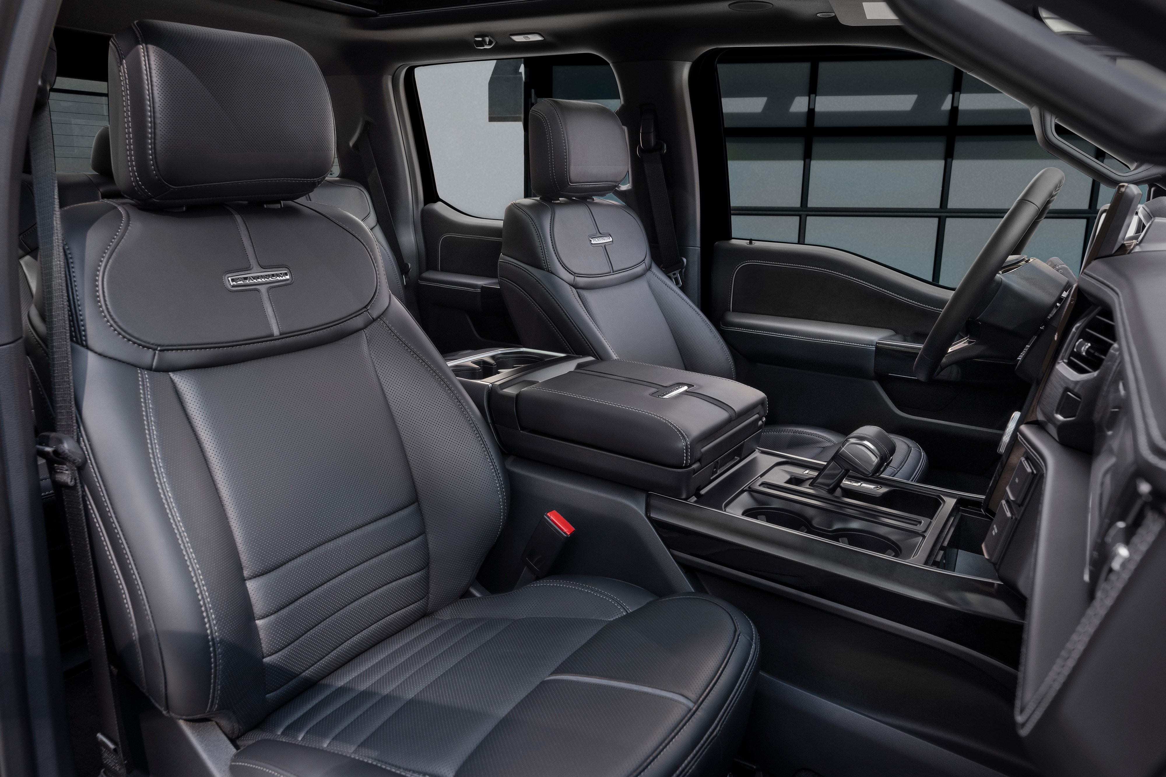 The sleek black interior of the 2025 F-150® Lightning® Dark Elements package.